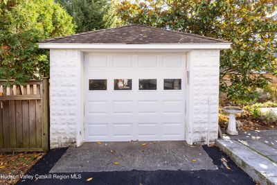 One car garage with door opener. | Image 2