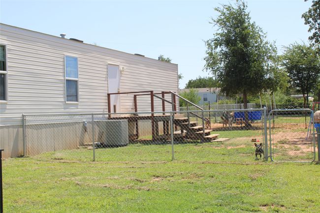View of yard featuring central AC | Image 20