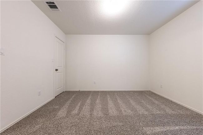 Carpeted spare room featuring baseboards | Image 15