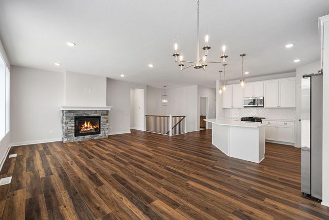 This spacious dining room offers an ideal setting for both intimate dinners and larger gatherings. With plenty of natural light, elegant finishes, and an open layout, it creates an inviting atmosphere for any occasion. | Image 14