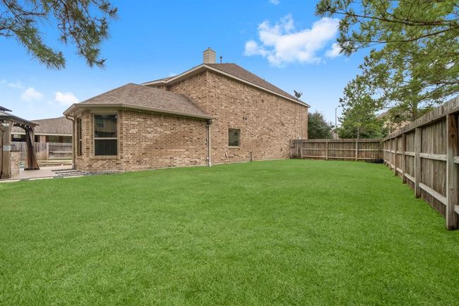 Spacious side yard for play set or garden. | Image 37