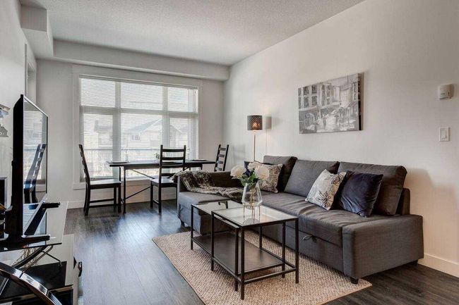 104 - 15 Aspenmont Heights Sw, Home with 2 bedrooms, 2 bathrooms and 1 parking in Calgary AB | Image 3