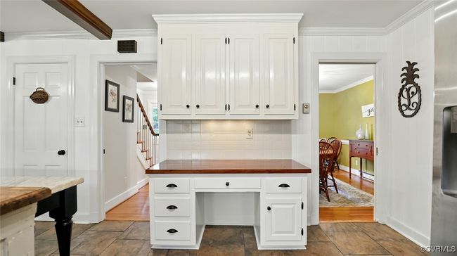 Office with stone tile flooring and ornamental molding | Image 37