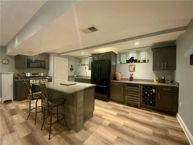 Full kitchen including appliances and a wine refrigerator! | Image 19