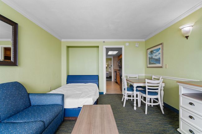 Bedroom featuring crown molding | Image 7