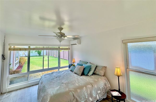Primary bedroom with bright and airy windows | Image 11