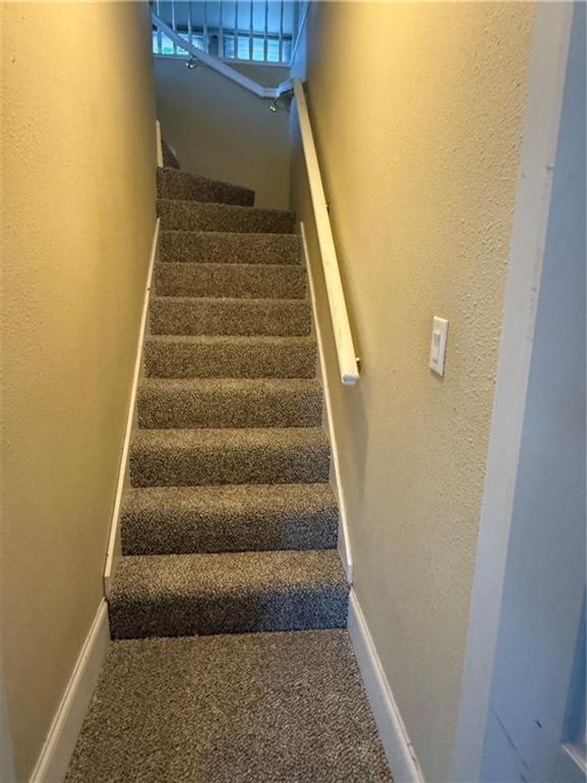 Staircase featuring carpet floors and baseboards | Image 18