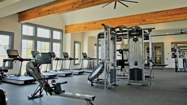 Exercise room with beam ceiling and ceiling fan | Image 31