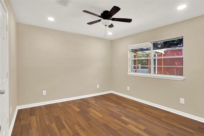 another view of bedroom three facing backyard | Image 26
