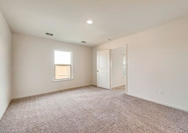 Spare room with visible vents, baseboards, and light colored carpet | Image 6