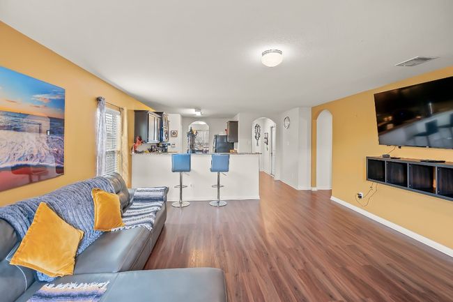 Living room with hardwood / wood-style floors | Image 9