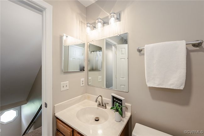 Bathroom with toilet and vanity | Image 41