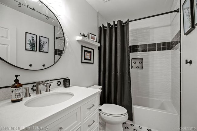 1st floor updated hall bath | Image 21