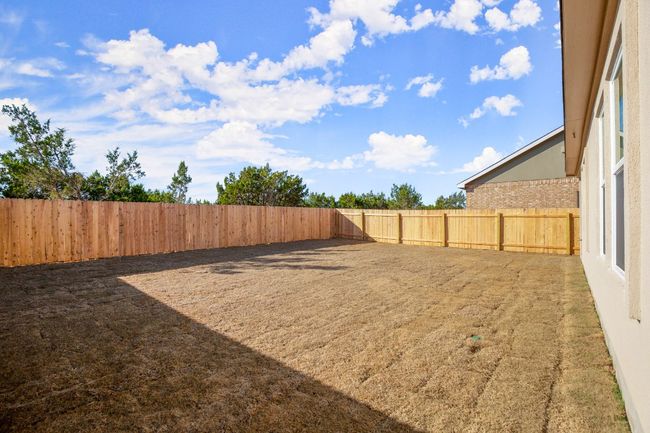 View of yard featuring a fenced backyard | Image 26