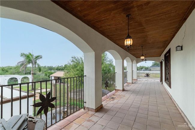 View of patio with a balcony | Image 26