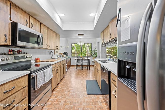 8268 Garrison St, House other with 3 bedrooms, 3 bathrooms and null parking in Spring Hill FL | Image 25