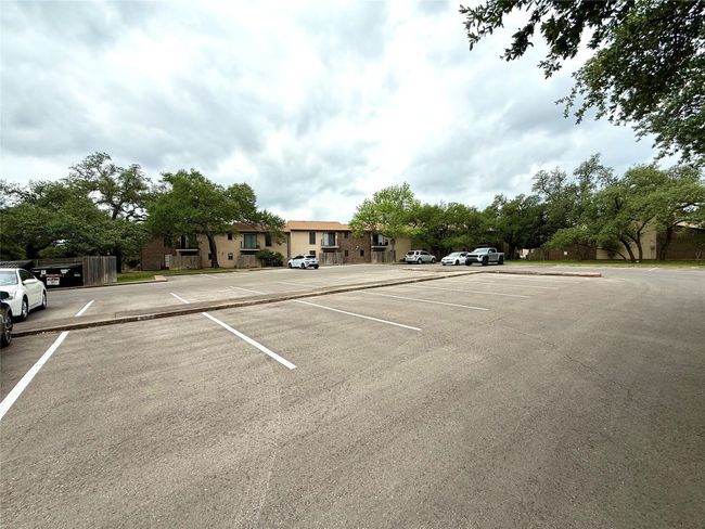 View of uncovered parking lot | Image 21