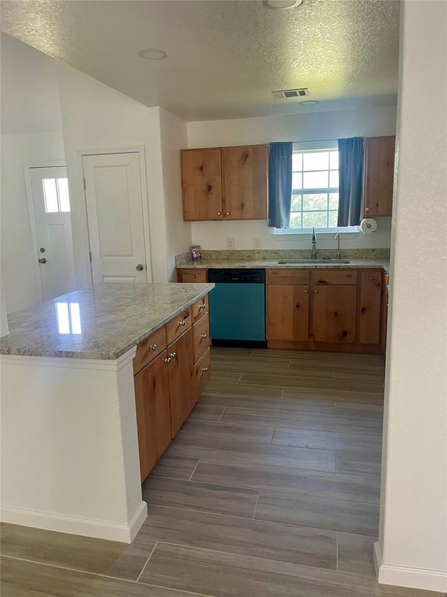Plenty of cabinet space and drawers. Granite countertops | Image 6