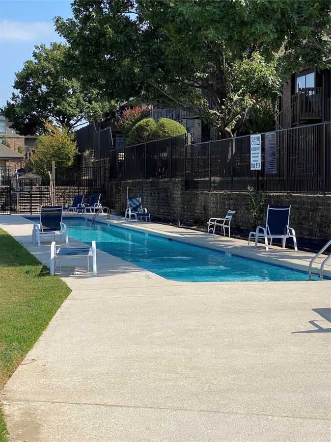 Community pool with a patio | Image 26