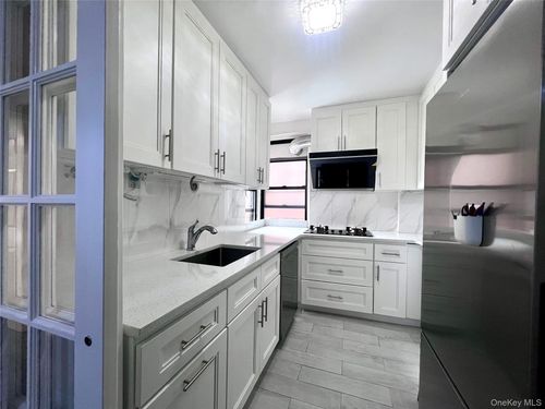 b37-102-32 65th Ave, Forest Hills, NY, 11375-1706 | Card Image