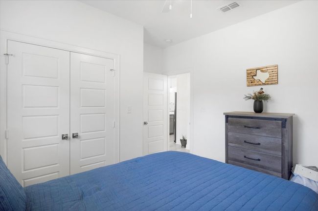 Bedroom featuring a closet and visible vents | Image 27