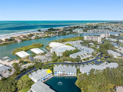 ... Yellow Star 1841...Aerial From Building 8 Looking North West. Its about a ten Minute Walk From Unit #1841 to Indian Rocks Beach. In the Mornings You will Pass People Either Walking or Bike Riding to the Beach, Post Office or Chasing Breakfast Somewhere.. I Once Sold To A Couple Who Would Drop a Kayak in the Intracoastal and Be at their Favorite Beach Restaurant in Two Minutes.. | Image 1