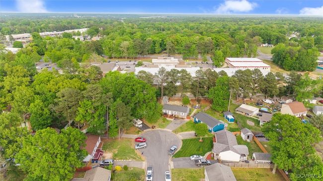 Drone / aerial view with a wooded view and a residential view | Image 41