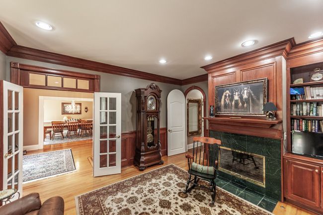 Enjoy reading your favorite book while snuggling up by a cozy fire in the fireplace. | Image 29