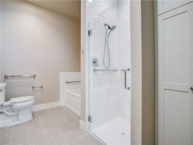 Grab bars in bathroom and no-curb shower entracnce for wheel chair accessabiity. | Image 6