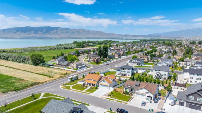 Aerial perspective of suburban area featuring a water and mountain view | Image 38