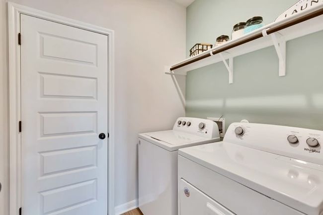 Laundry area with washer and dryer | Image 15