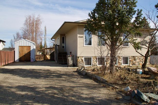 9502 123 Avenue, Home with 4 bedrooms, 2 bathrooms and 4 parking in Grande Prairie AB | Image 2