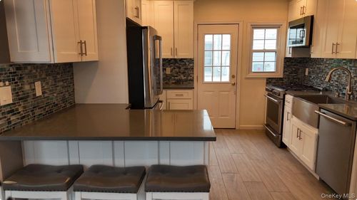48 Rosebud Ave, Merrick, NY, 11566-4554 | Card Image