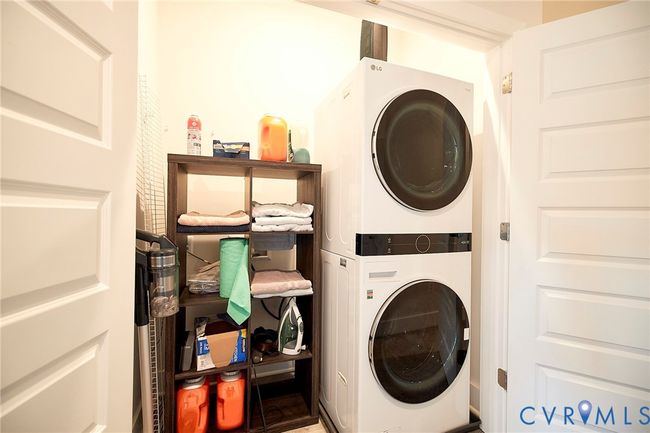 Laundry area featuring stacked washer / dryer | Image 20