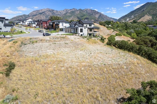 View of mountain backdrop featuring nearby suburban area | Image 42