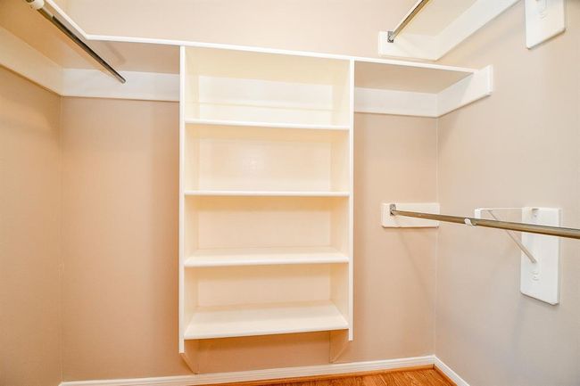 Primary walk-in closets | Image 26