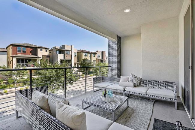 This large entertaining balcony has direct access from the family room. | Image 11