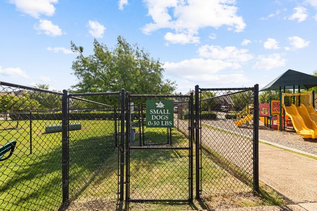 View of gate with a lawn and fence | Image 35