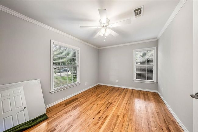 A look into a guest suite after floors were refinished but before Phase II of the project began. | Image 35