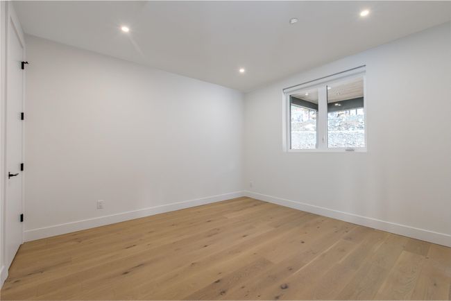 Empty room featuring light wood finished floors, recessed lighting, and baseboards | Image 38