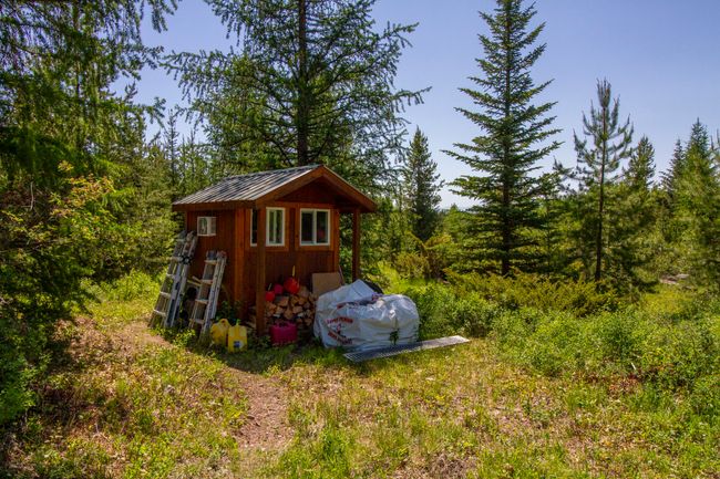 View of shed with electricity and a forest view | Image 19