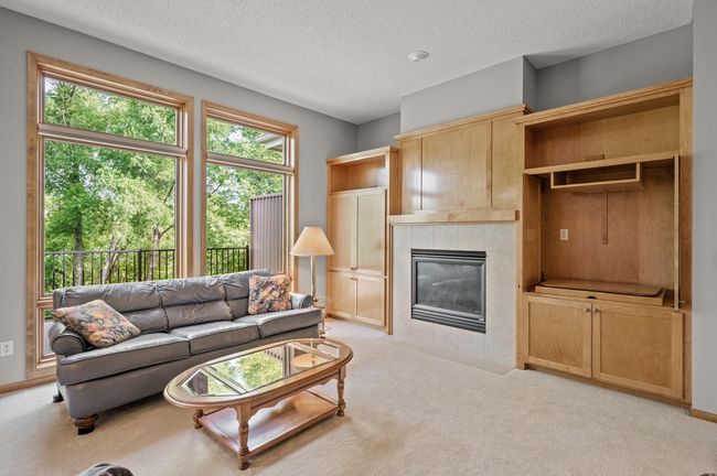 There are two fireplaces to keep the living and family rooms toasty warm. | Image 5