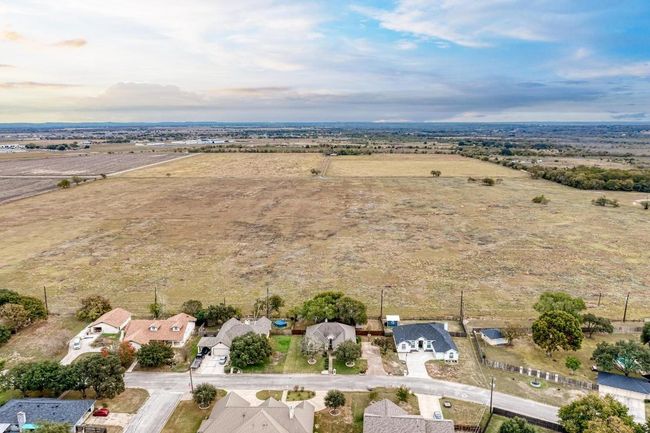 Overview of rural landscape featuring nearby suburban area | Image 38