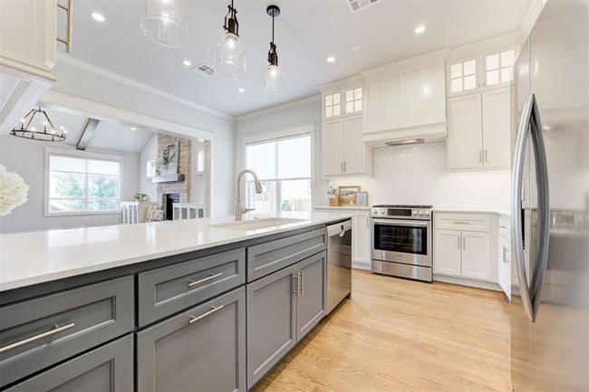 Plenty of cabinetry in the kitchen and built in appliances. | Image 11