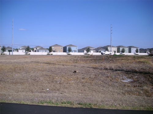 233 Cimarron Dr, KISSIMMEE, FL, 34759-5957 | Card Image