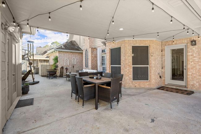 Plenty of space to entertain. French doors to the left enter into the additional room that includes a 1/2 bath. | Image 38