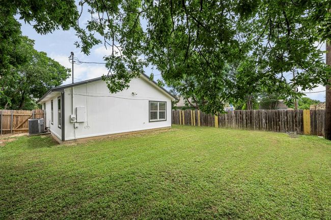 View of fenced backyard | Image 32