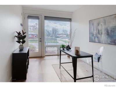 Step into the ground level foyer, offering an inviting entry to the home with convenient dual access through either the front door or the attached 2-car garage. A versatile room on this level provides flexibility to outfit it as a home office. | Image 3