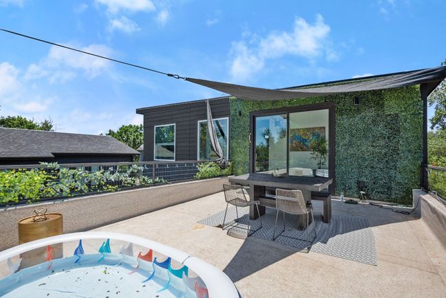 View of patio featuring outdoor dining space | Image 29