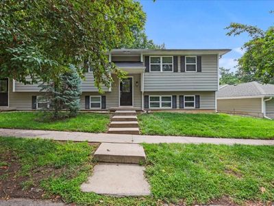 Split foyer home with a front lawn | Image 1